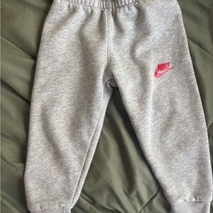 Nike Kids Gray Sweatpants with Pink Logo Accent